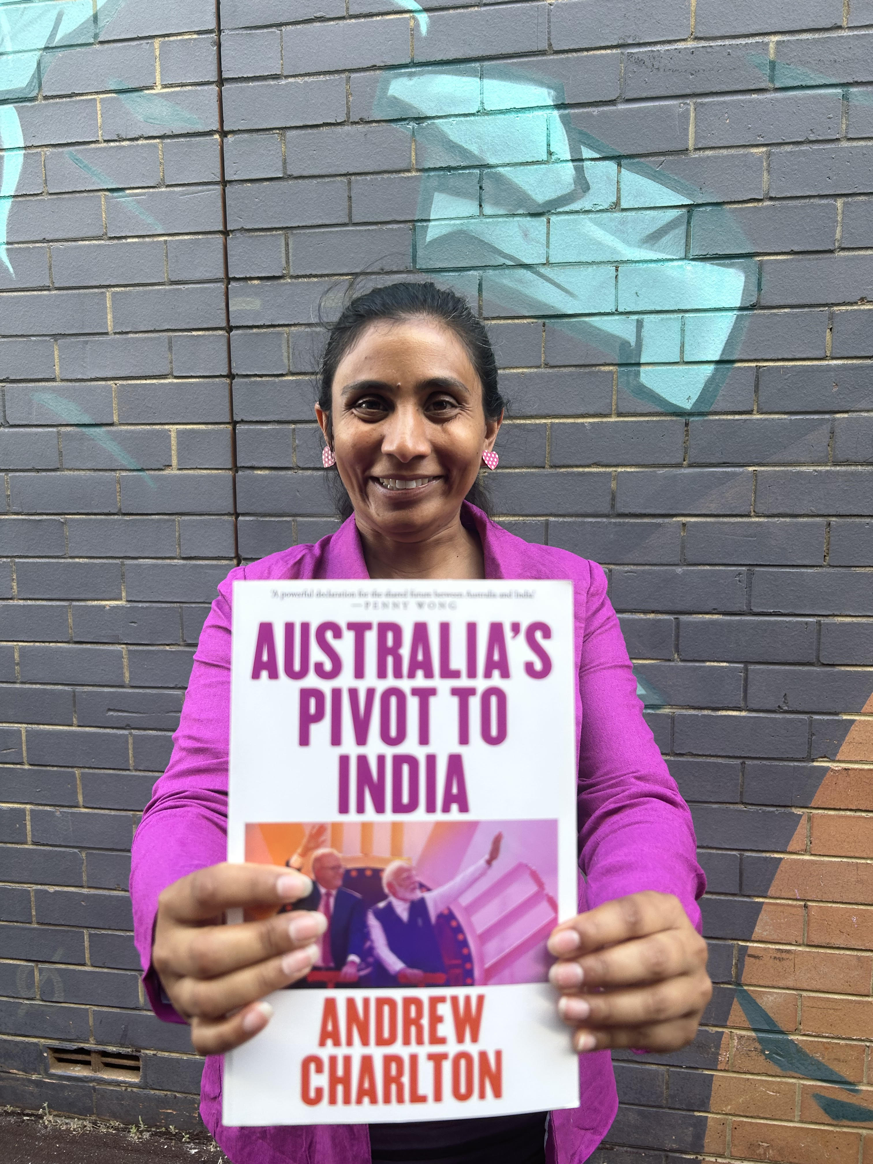 Zaneta Mascarenhas MP holds the book "Australia's Pivot to India" by Andrew Charlton
